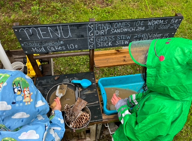 children playing with mud